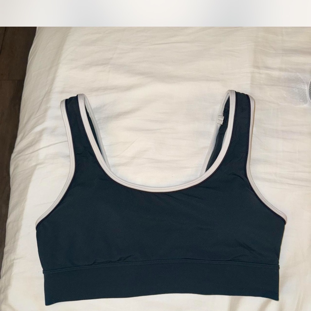 athleta dark green breathe longline bra with black and white piping